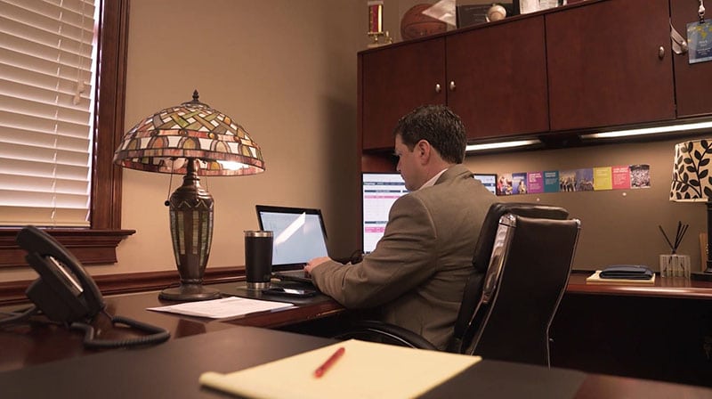 Nick Gant at desk