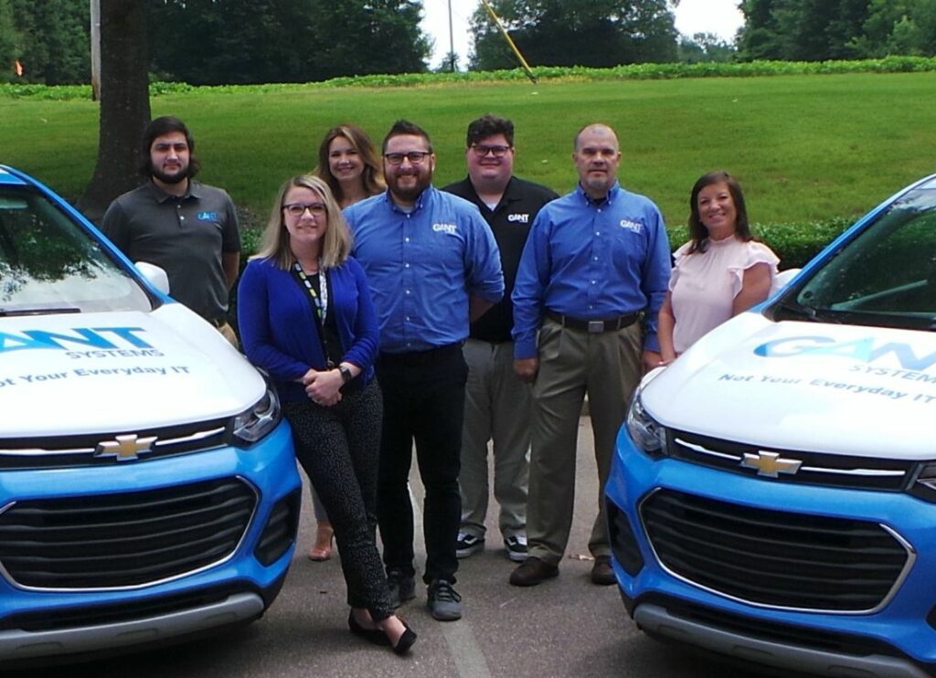 Gant Systems team with two Gant Systems branded cars