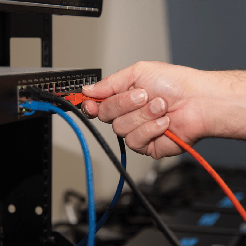 hand plugin cable into box